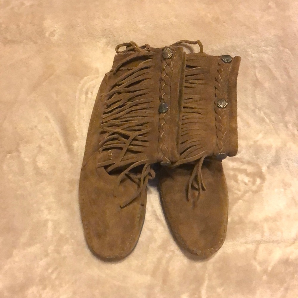 Soft leather brown ankle boots by Minnetonka.